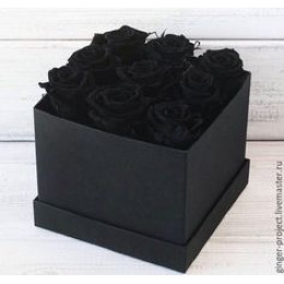 9 чёрных роз в коробке